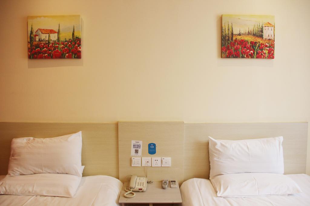 Hanting Express Jinzhou Luoyang Road Central Avenue Room photo