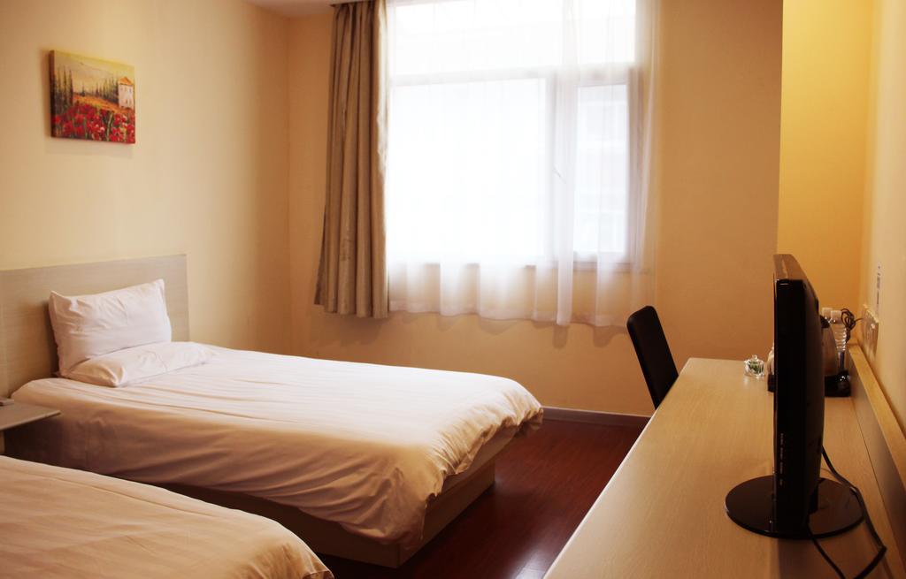 Hanting Express Jinzhou Luoyang Road Central Avenue Room photo